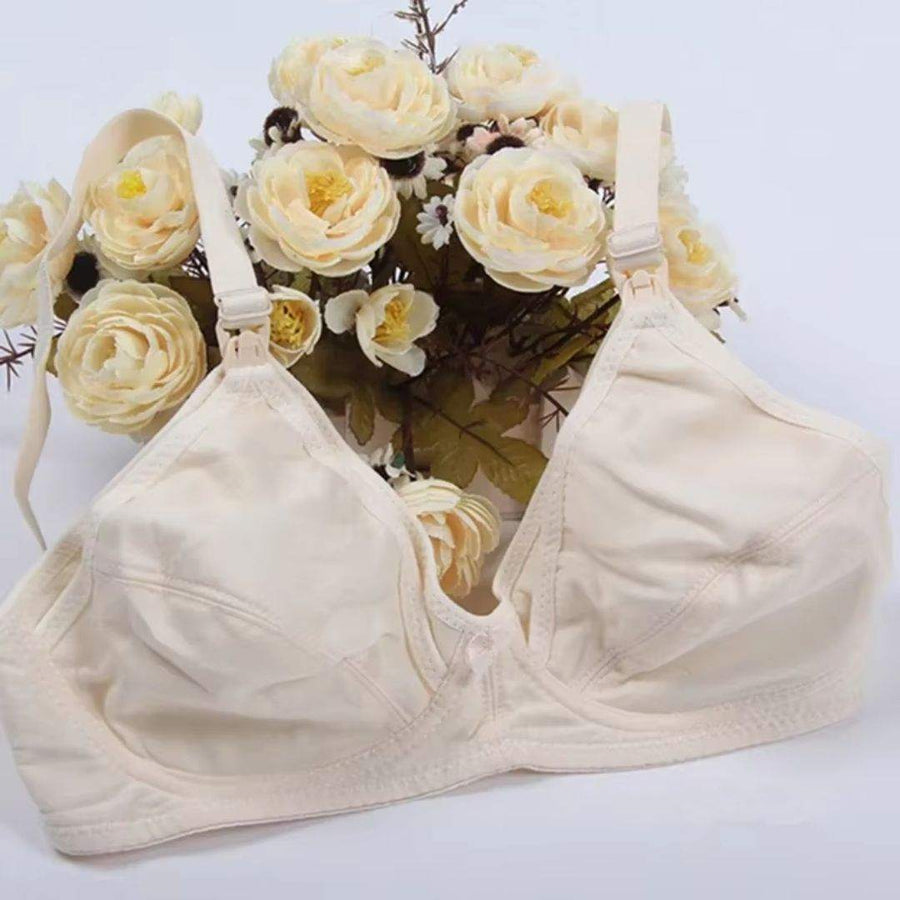 Soutien-Gorge d'Allaitement avec confort et élégance pour mamans modernes, posé délicatement devant un bouquet de fleurs.